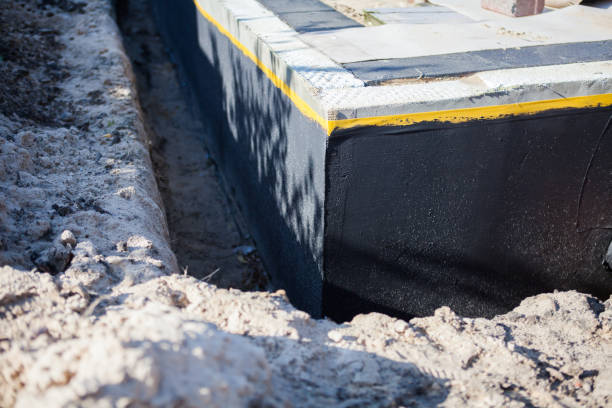 Professional Emergency Waterproofing technician working in Jeffersonville, IN